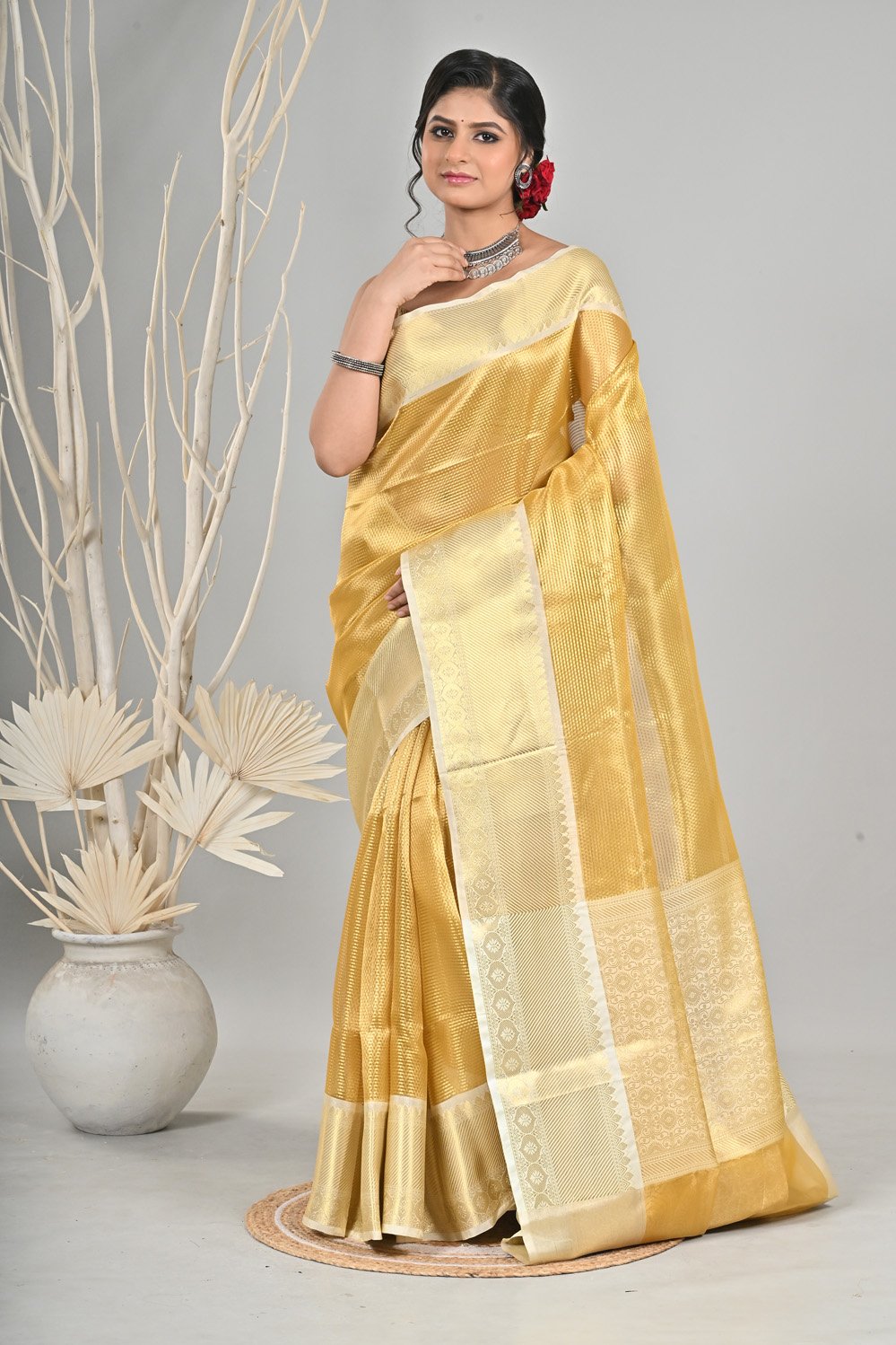 Exquisite Golden Tissue Saree with Intricate Border - Image 3